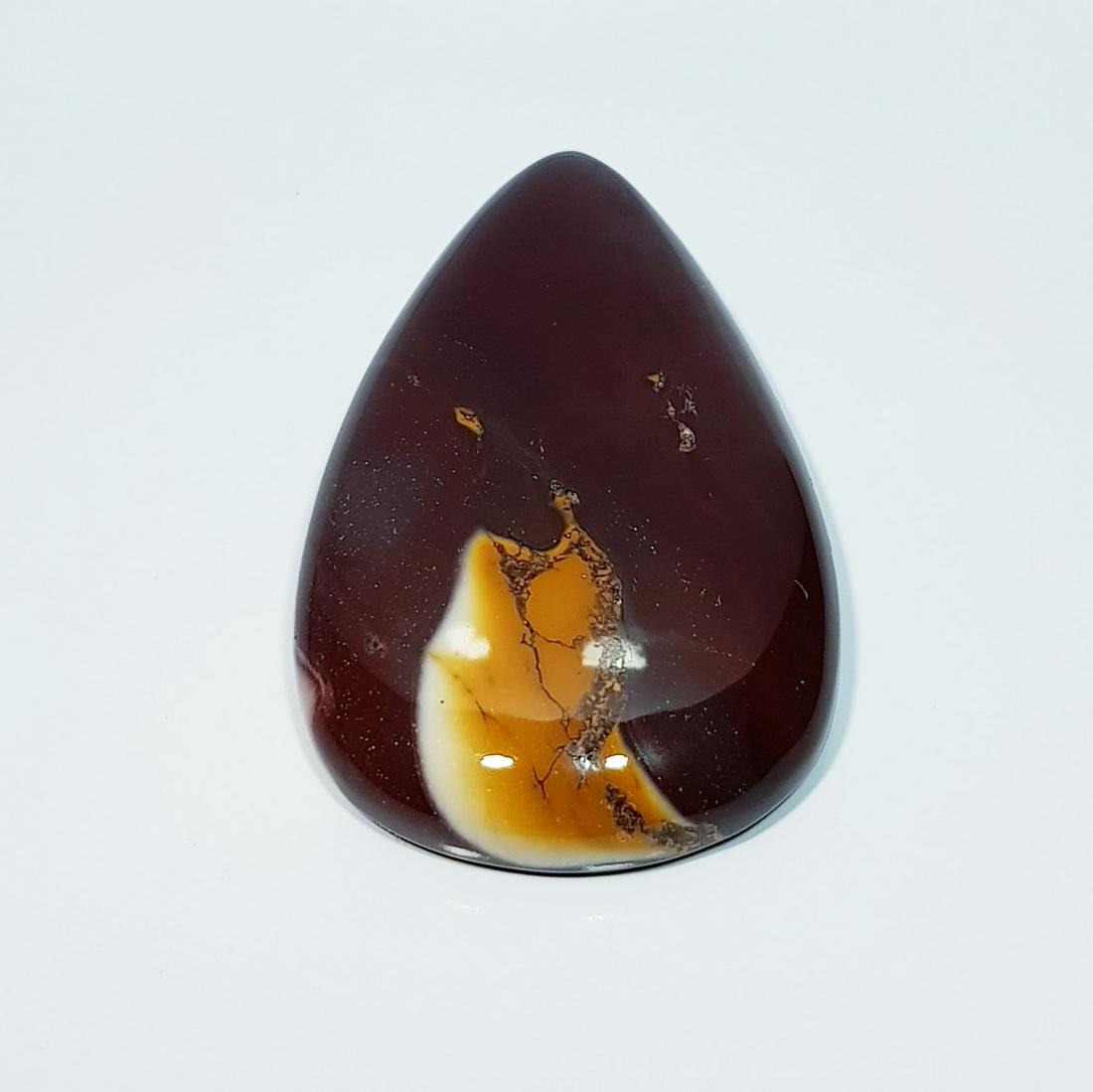 101.20 Ct Natural American Jasper: No Reserve! Title: 101.20 Ct Natural American Jasper Color/Clarity: Opaque Carat Weight: 101.2 Dimensions: 50.45 x 29.65 x 8.70 Additional Information: Pear - Africa Shipping: Domestic: Flat-rate of