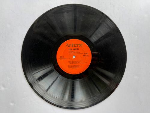 TWO RARE EVEL KNIEVEL ALBUMS WITHOUT COVERS (1 of 1)
