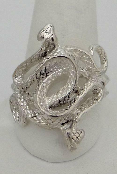MENS METAL 2 TWO INTER TWINED SNAKES BAND BIKER FASHION: MENS METAL 2 TWO INTER TWINED SNAKES BAND BIKER FASHION RING 28mm 11 1/2 35020 Mens Metal Two Inter-twined Snakes Ring! This ring shows some very light surface scratches and the metal is chipping off 