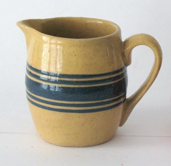 Vintage miniature yellow ware creamer. (1 of 2)