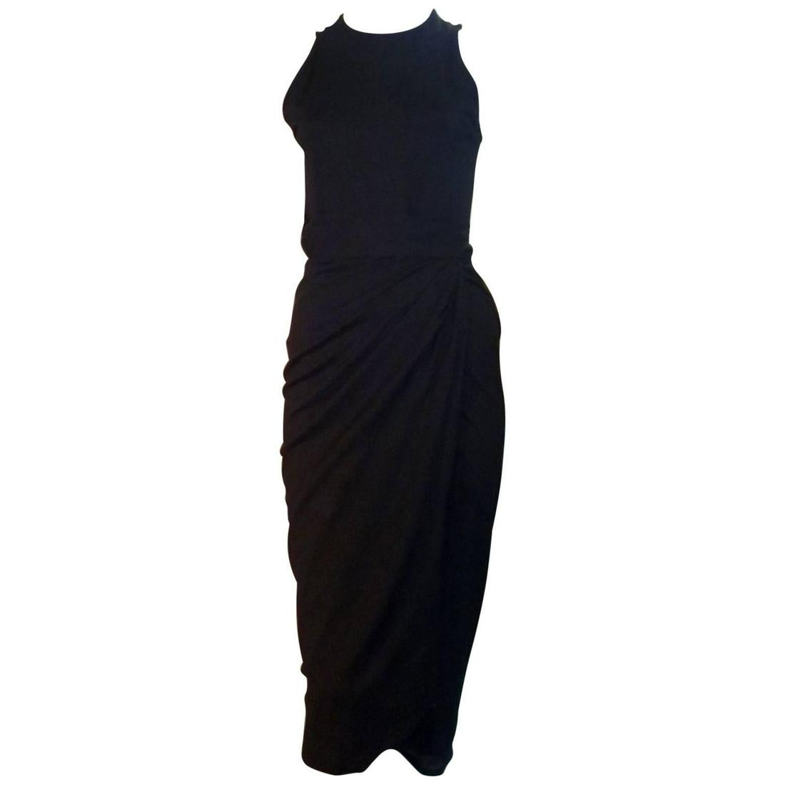 1980s Lolita Lempicka Bis Black Bodysuit with Attached: Very nice black jersey with stretch bodysuit with a wrap draped attached skirt. When secured it look like an elegant long dress. Closure is by a hidden back zip. Designer Josiane Maryse Pividal Brand 