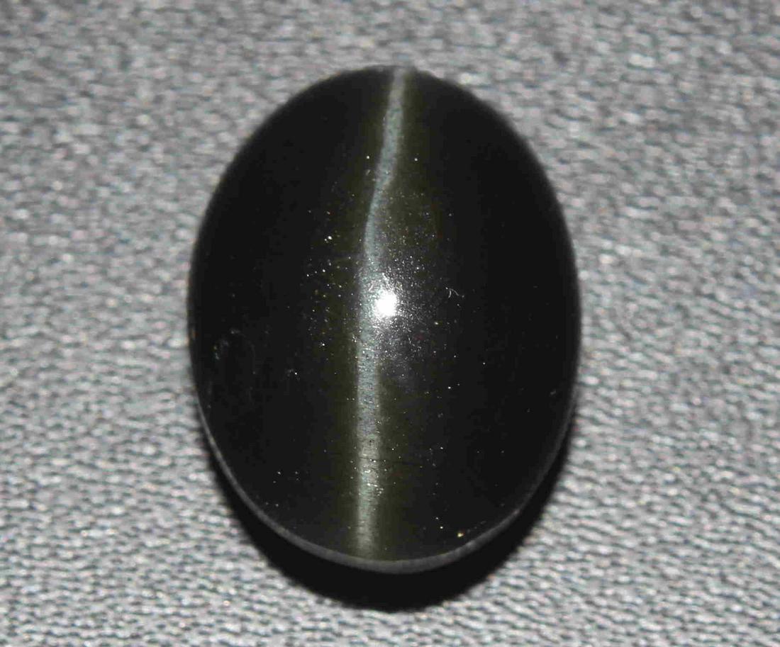 16.90 Cts Natural Scapolite Cat's-Eye: No Reserve! Shipping: Domestic: Flat-rate of $7.00 to anywhere within the contiguous U.S. International: Foreign shipping rates are determined by destination. Combined shipping: $3.00 for each additio