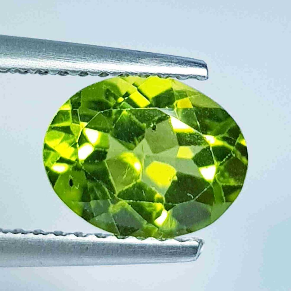 1.75 Ct Natural Peridot Oval Cut: No Reserve! Title: 1.75 Ct Natural Peridot Oval Cut Color/Clarity: IF - VVS Gemstones: Loosegemstone Carat Weights: 1.75 Size/Dimensions: 8.90 x 7.00 x 4.20 Additional Information: Oval / Pakistan Shi