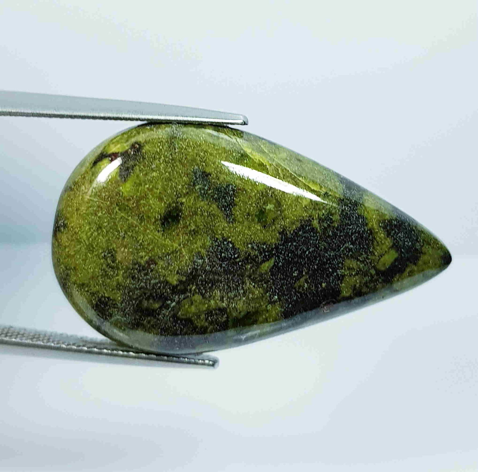 32.00 Ct Natural Dragon Jasper: No Reserve! Title: 32.00 Ct Natural Dragon Jasper Color/Clarity: Opaque Gemstones: LooseGemstone Carat Weights: 32 Size/Dimensions: 33.70 x 19.80 x 5.75 Additional Information: Pear - Africa Shipping: