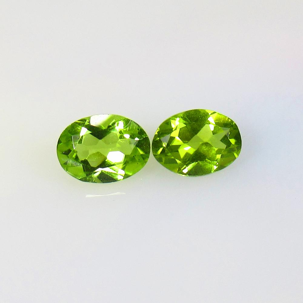 2.48 Ctw Natural Pakistan Peridot Oval Pair: No Reserve! Title: 2.48 Ctw Natural Pakistan Peridot Oval Pair Stone Clarity: VVS Gemstone: Peridot Carat Weight: 2.48 Size/Dimensions: 8.00 x 6.00 x 3.90 mm / 2 PC's Additional Information: Top Class