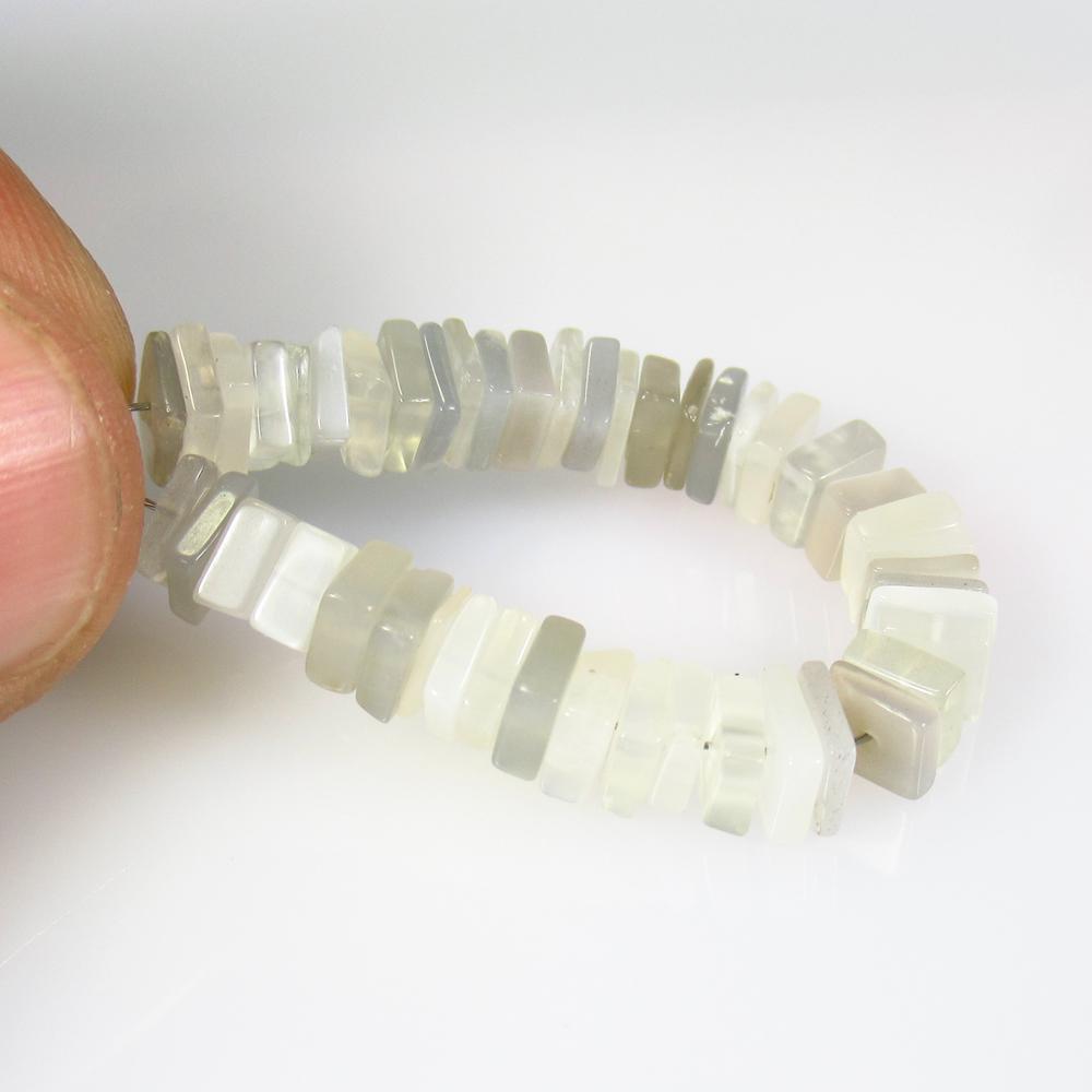 17.35 Ctw Natural 46 Drilled Moonstone Square Beads: No Reserve! Title: 17.35 Ctw Natural 46 Drilled Moonstone Square Beads Stone Clarity: Semi-Transparent Gemstone: Moonstone Beads Carat Weight: 17.35 Size/Dimensions: 4.5x4.6 - 5.0x4.2 mm / 46 PC's Add