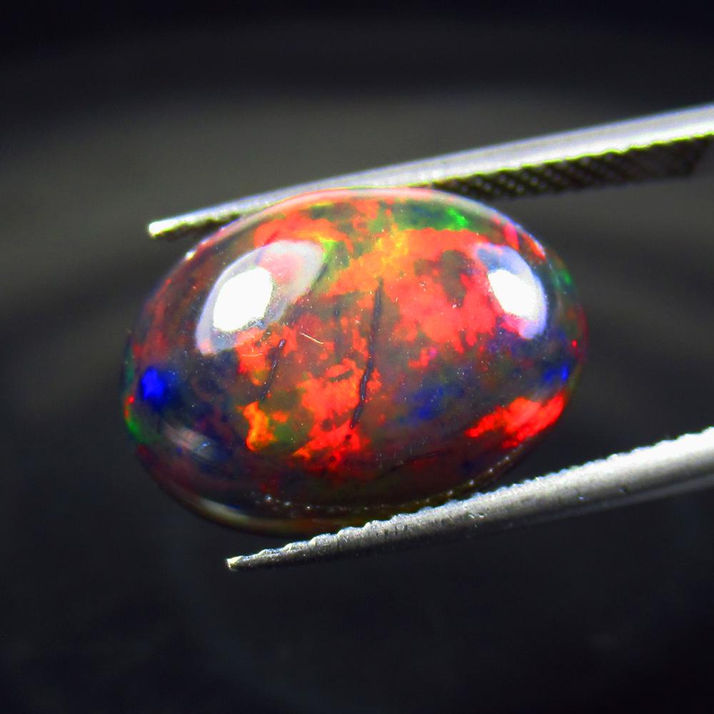 5.74 Ct Natural Ethiopian Black Fire Opal Oval Cab (1 of 2)