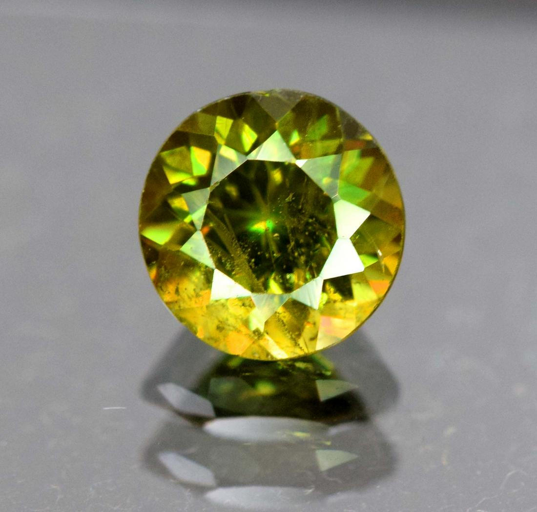 0.75 carats AAA Color Full Fire Mossy Green Sparkles: AAA Color Full Fire Mossy Green Sparkles Natural Chrome Sphene Loose Gemstone Dimensions (mm) ~ 5.90*5.90*4 mm Weight (carats) 0.75 carats Treatment : Natural Origin : Skrdu Pakistan DHL Global Reserv