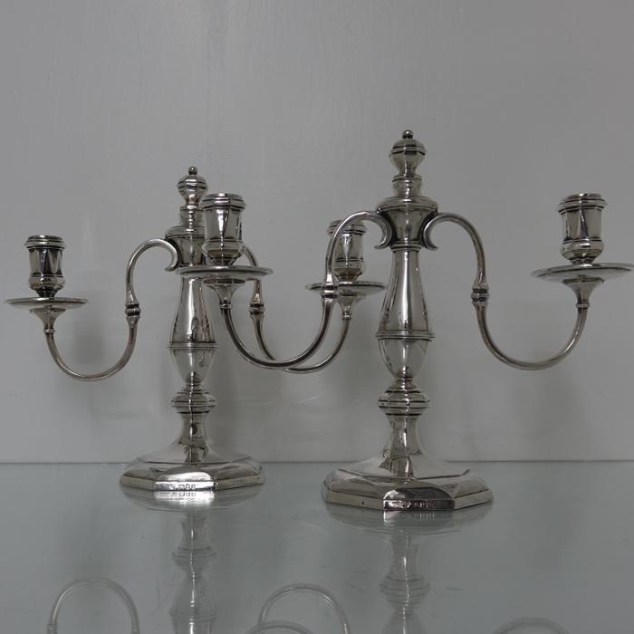 Early 20th Century George VI Sterling Silver Pair: Title: Early 20th Century George VI Sterling Silver Pair Candelabra London 1937 Goldsmiths & Silversmiths Co Ltd Subtitle: A very beautiful pair of George VI octagonal themed fixed branch two light ca