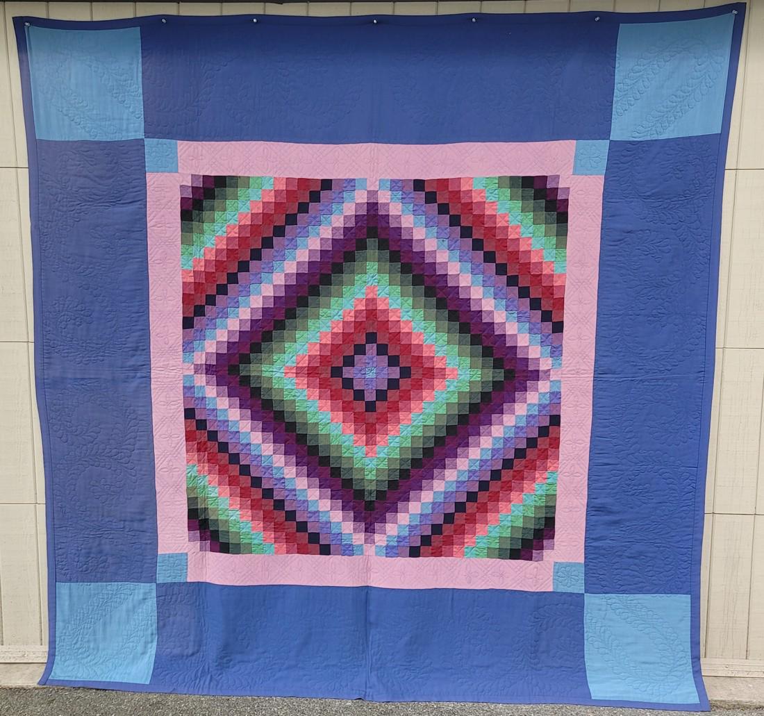 Amish sunshine and shadows quilt ca 1940's: Title: Amish sunshine and shadows quilt ca 1940's Dimension: 83" x 84" Additional Information: A very graphic sunshine and shadow quilt with inner and outer corner blocks. Princess feather and pumpkin