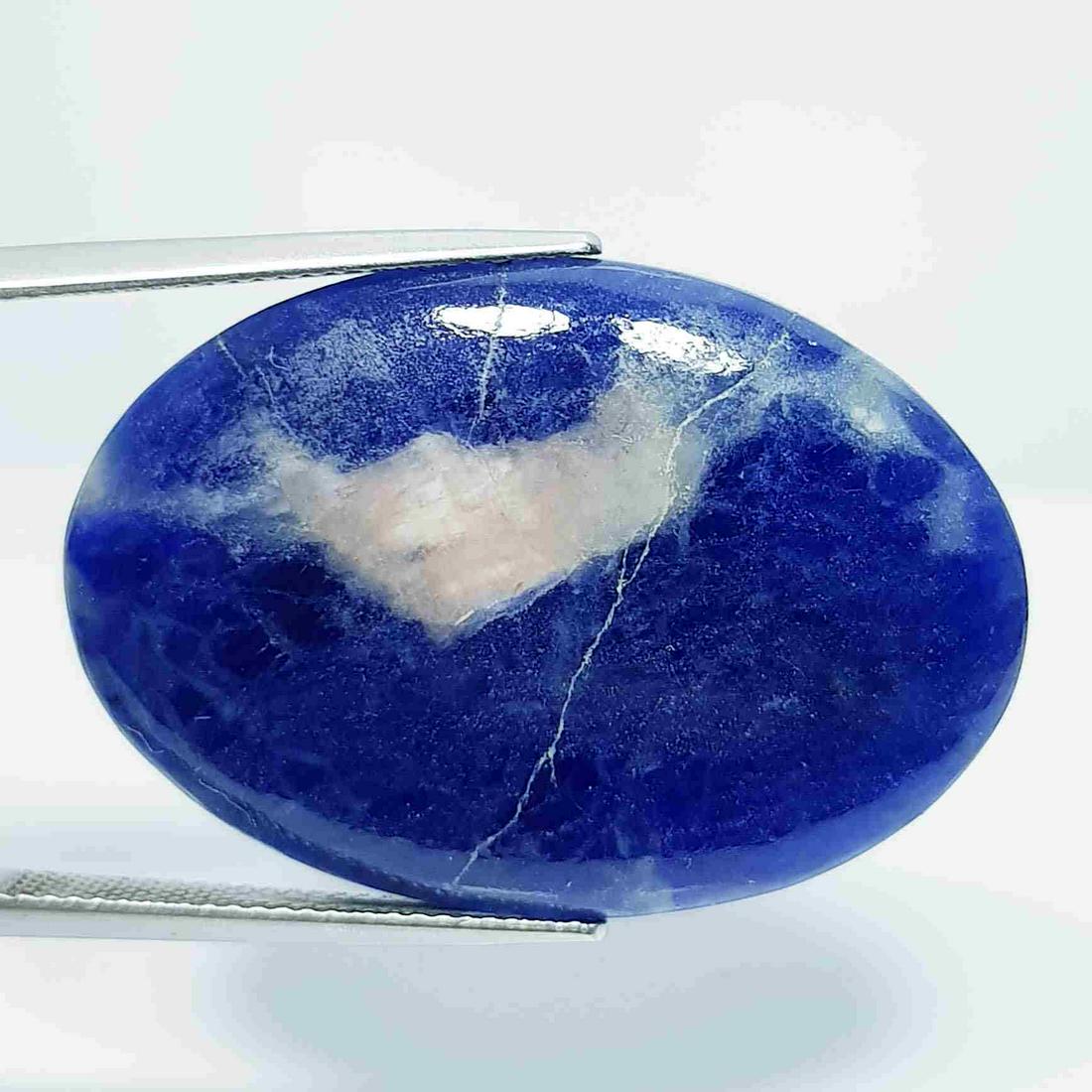 28.00 ct Natural Sodalite: No Reserve! Title: 28.00 ct Natural Sodalite Color/Clarity: Opaque Gemstones: Loosegemstone Carat Weights: 28 Size/Dimensions: 34.60 x 23.75 x 4.75 Additional Information: Oval - Brazil Shipping: Do