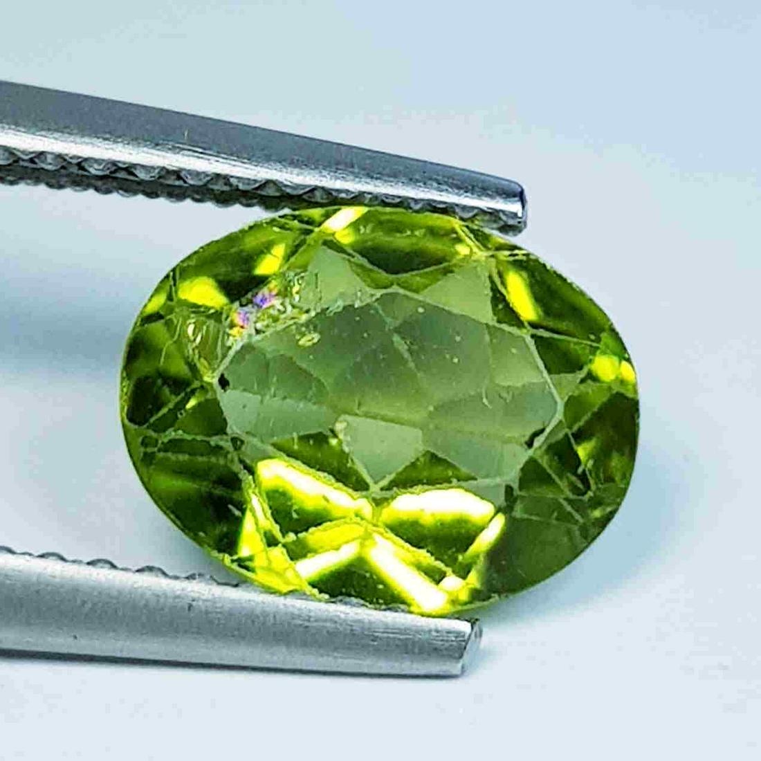 1.68 Ct Natural Peridot Oval Cut: No Reserve! Title: 1.68 Ct Natural Peridot Oval Cut Color/Clarity: IF - VVS Gemstones: Loosegemstone Carat Weights: 1.75 Size/Dimensions: 8.90 x 7.00 x 4.20 Additional Information: Oval / Pakistan Shi