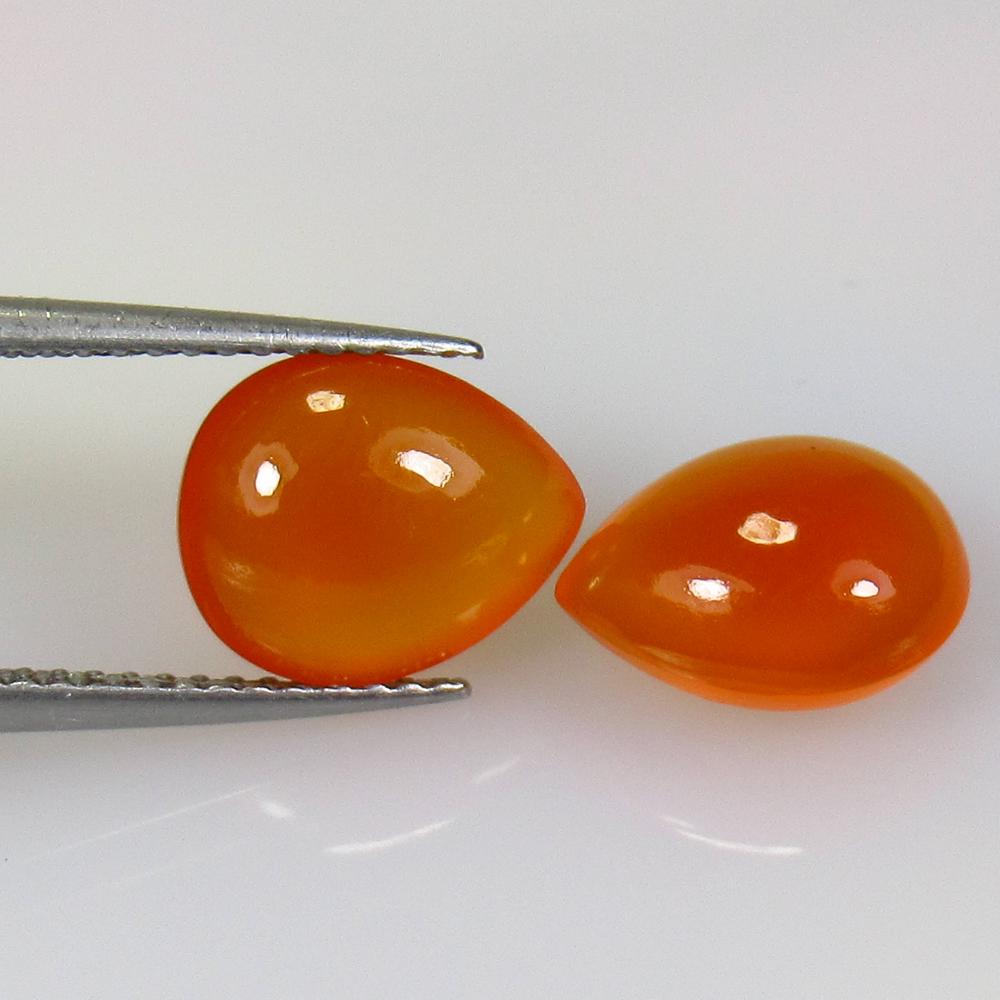 5.41 Ct Natural Orange Carnelian Pear Pair: No Reserve! Title: 5.41 Ct Natural Orange Carnelian Pear Pair Stone Clarity: Semi-Transparent Gemstone:Natural Carnelian Carat Weight: 5.41 Size/Dimensions: 10.20 x 8.30 x 5.50 mm / 2 Pc's Additional 