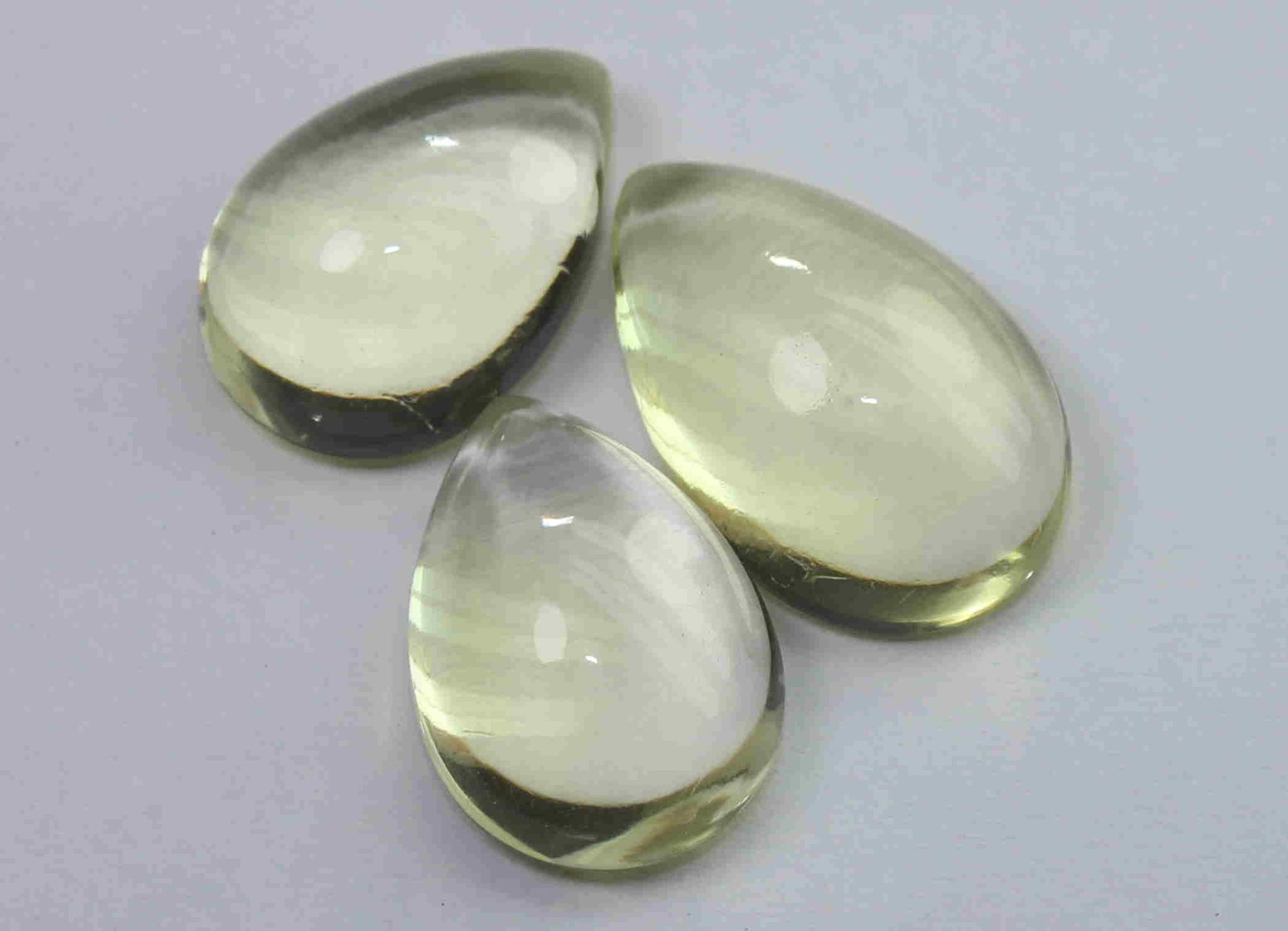 9.81 Cts Natural Lemon Quartz Lot: No Reserve! Title: 9.81 Cts Natural Lemon Quartz Lot Additional Information: Gemstone : Natural Lemon Quartz Weight : 9.81 Carats Dimensions : 13.3x8.5x4.9 mm , 11.8x8.2x4.6 mm , 11.7x7.8x4.8 mm Shape