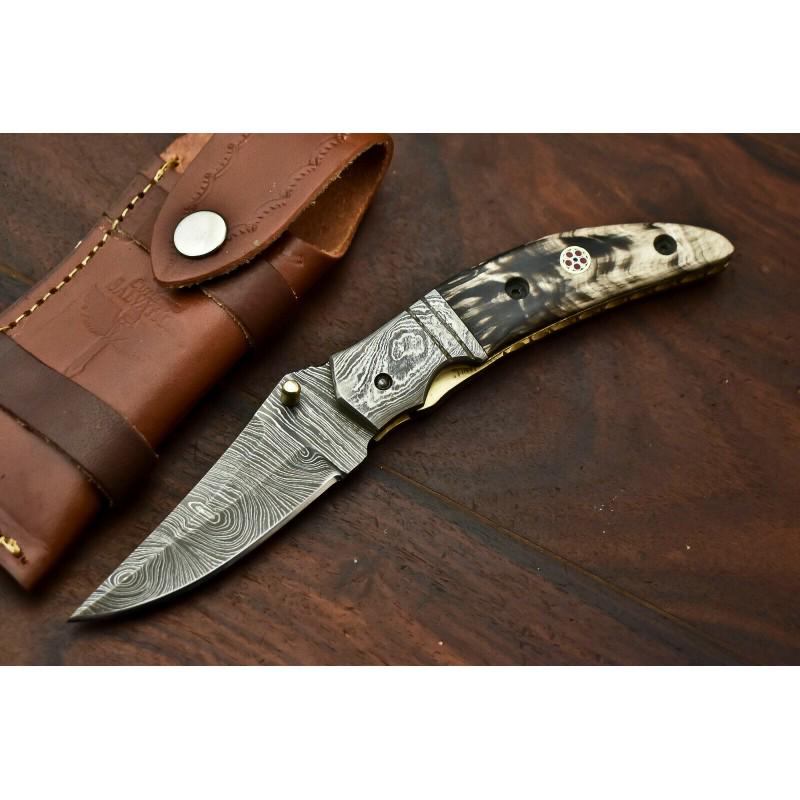 Everyday carry pocket folding damascus steel knife: Knife "Cookies" Blade - damask steel Handle Â– camel bone Scabbard Â– cowhide leather (included) Blade hardness Â– 58-60 HRC Total length Â– 178 mm. Blade length - 76 mm. Handle length Â�