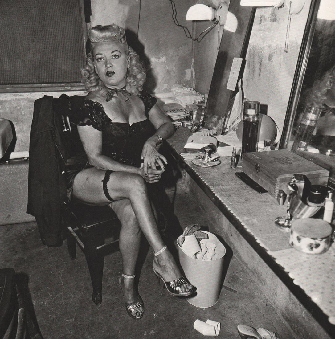 DIANE ARBUS - Burlesque comedienne in her dressing: Artist: DIANE ARBUS Print Title: Burlesque comedienne in her dressing room, Atlantic City, NJ, 1963 Medium: Photoengraving Printed 1970’s in the US Image size (inches) approx. 8 x 8” Diane Arbus (