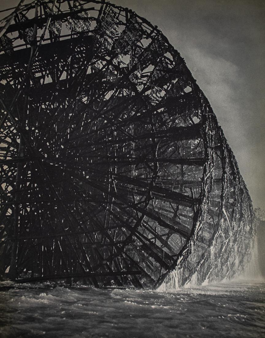 PIERRE VERGER - Water Wheel: Artist: Pierre Verger Title: Water Wheel Medium: Sheet Fed Gravure, 1939, France Dimensions: 9x11.5" Description: Heat Wax Mounted on 14x18" Conservation board Artist Bio: Pierre Edouard Leopold Verge
