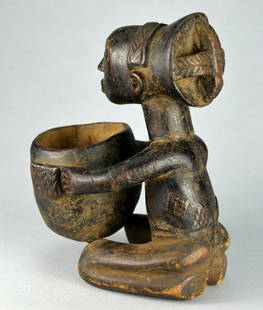 LUBA Cup Bearer figure statue Congo African Tribal Art: CONGO DRC LUBA Cup Bearer The famous “Cup bearers” of the Luba are sacralized sculptures, representing a seated, kneeling (or much more rarely standing) woman holding with her two hands (or more