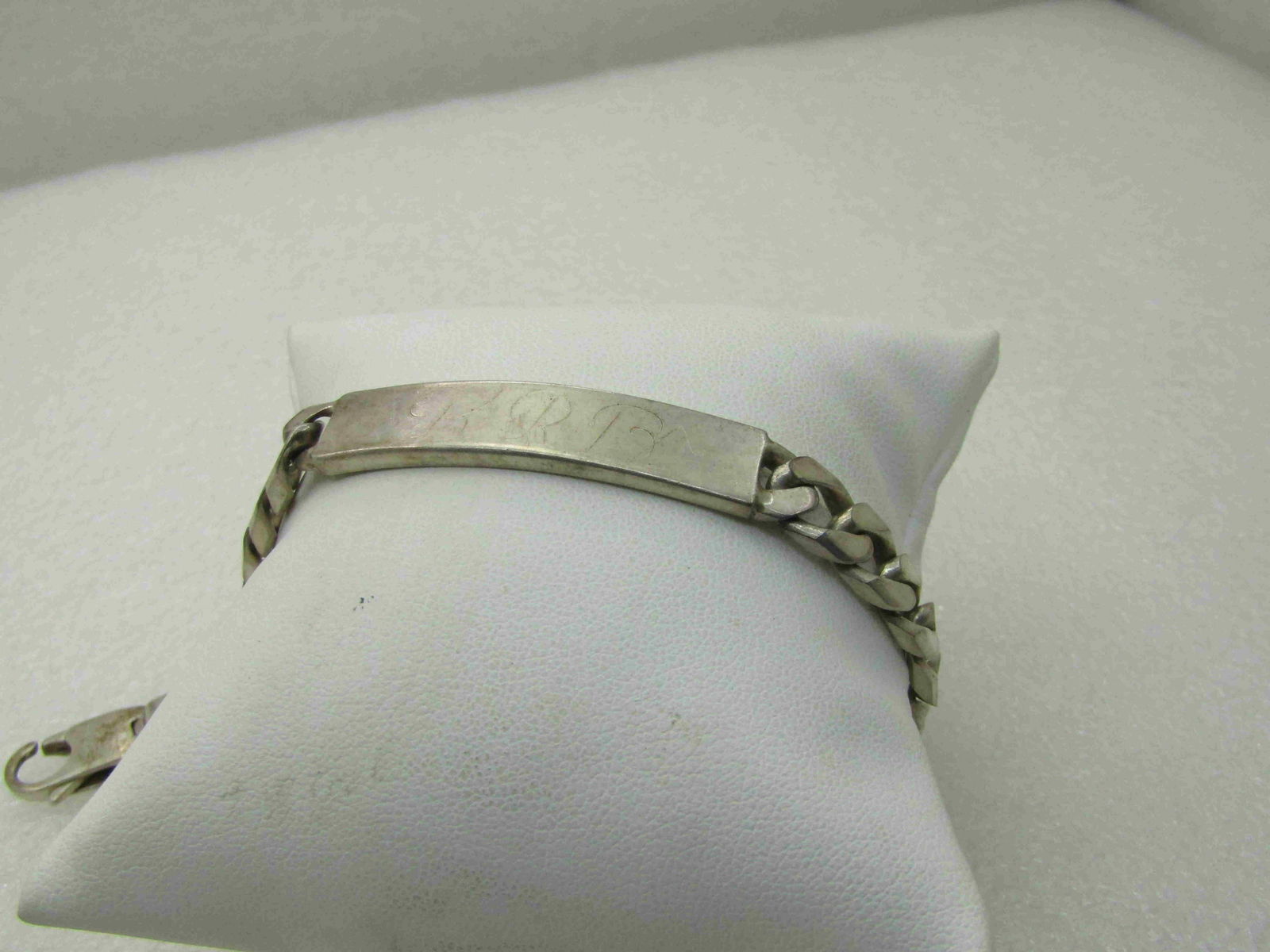 Vintage Sterling Silver Men's I.D. Bracelet, KRB,: Vintage Sterling Silver Men's I.D. Bracelet, KRB, 8.25", 8mm wide, Signed Italy and marked .925. This has the initials KRB in light engraving. Your jeweler could likely buff that out and re-engrave. H