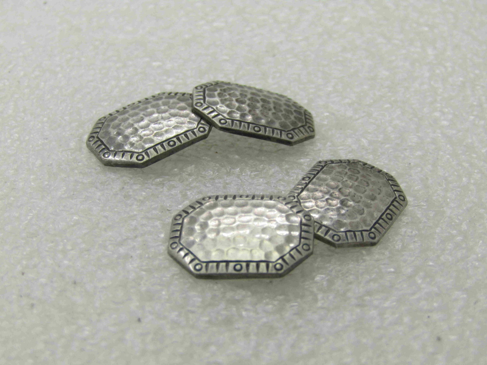 Vintage EIF & Co Sterling Cufflinks, Hammered, 1920's: Vintage EIF & Co Sterling Cufflinks, Hammered, 1920's, Appx. 5/8" wide and 1/2" tall with hammered center and angled dotted and lined frame. Signed E.I.F. Co. Sterling. Weight is appx. 6.15 frams. E.I