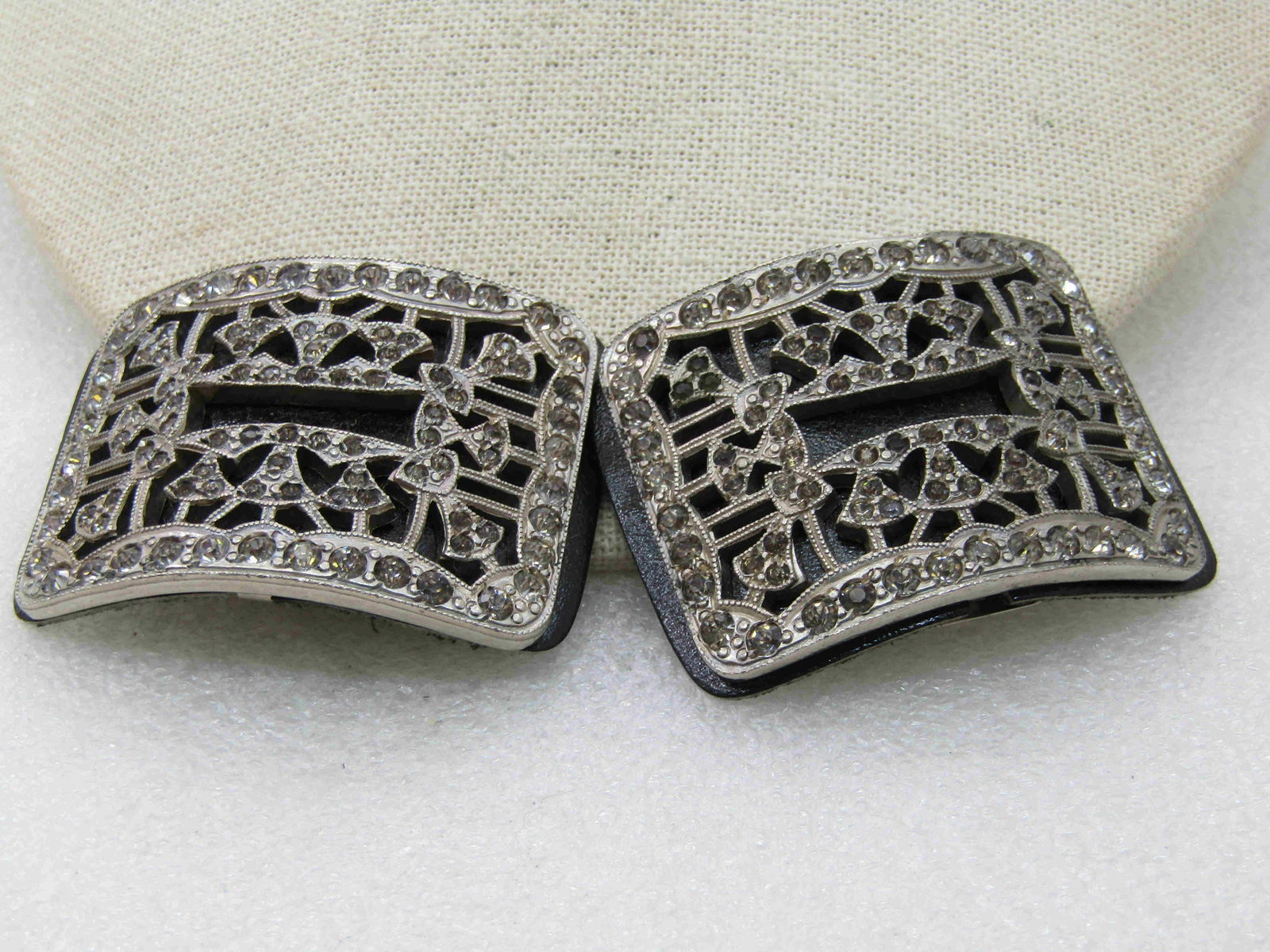 Vintage Rhinestone Shoe Buckles, Black & Silver Tone,: Vintage Rhinestone Shoe Buckles, Black & Silver Tone, 2-1/8 by 1-5/8". Domed rectangular with clips and black leather background. Rhienstones set in silver metal that may be .800 silver but not sterli