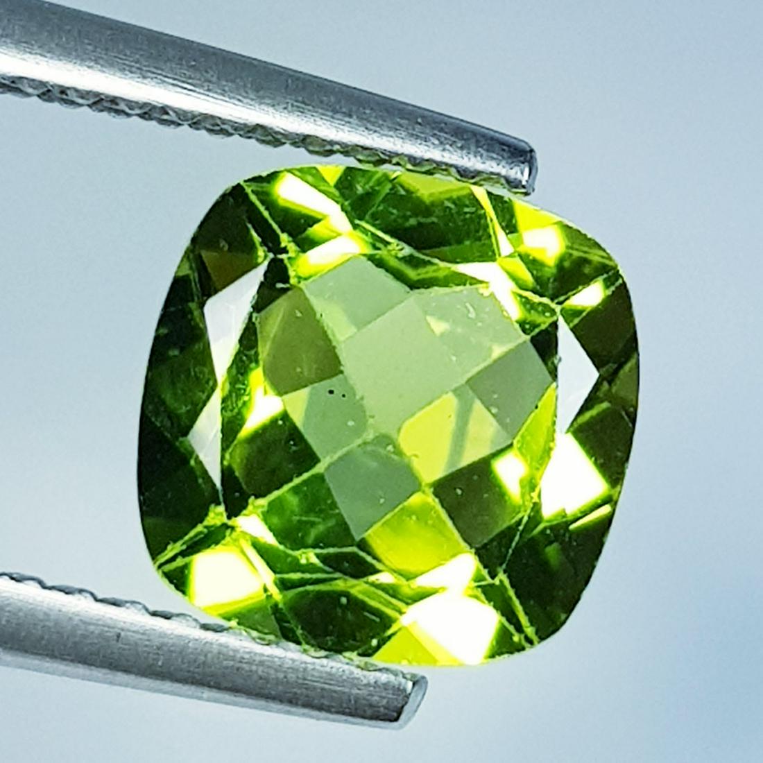 Natural Peridot Cushion Cut 2.47 ct: Title: Natural Peridot Cushion Cut 2.47 ct Color/Clarity: VVS Gemstones: Loosegemstone Carat Weights: 2.47 Size/Dimensions: 8.00 x 8.00 x 4.80 Additional Information: Cushion - Pakistan Shipping: Dome