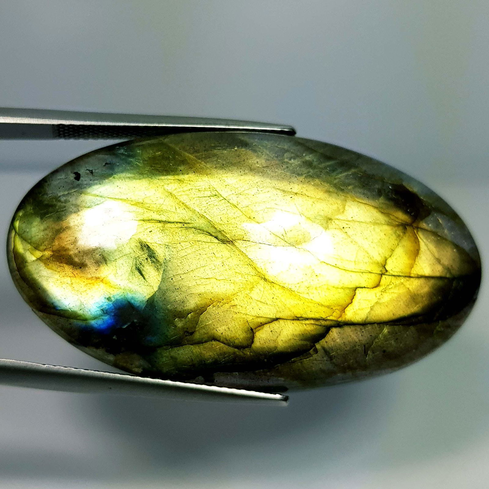49.32 Ct Natural Labradorite: Title: 49.32 Ct Natural Labradorite Color/Clarity: Opaque Gemstones: LooseGemstone Carat Weights: 49.32 Size/Dimensions: 47.30 x 28.45 x 11.40 Additional Information: Oval - USA Shipping: Domestic: Fl