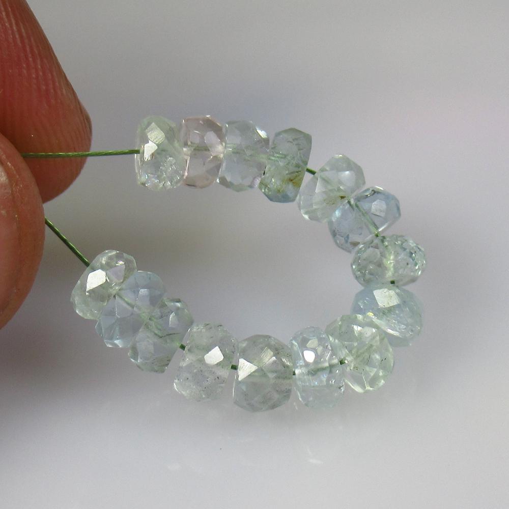 9.60 Ctw Natural 15 Aquamarine Drilled Round Beads: Title: 9.60 Ctw Natural 15 Aquamarine Drilled Round Beads Stone Clarity: Transparent Gemstone: Aquamarine Beads Carat Weight: 9.6 Size/Dimensions: 4.90 to 5.60 mm / 15 PC's Additional Information: Top
