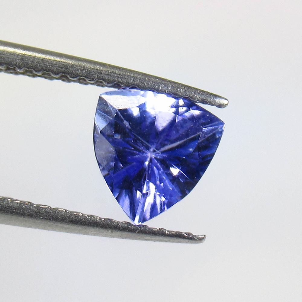 1.85 Ctw Natural Tanzanite Trillion Cut: Title: 1.85 Ctw Natural Tanzanite Trillion Cut Stone Clarity: VVS Gemstone: Tanzanite Carat Weight: 1.85 Size/Dimensions: 6.60 x 6.30 x 4.30 mm Additional Information: Top Quality Luster / Excellent T