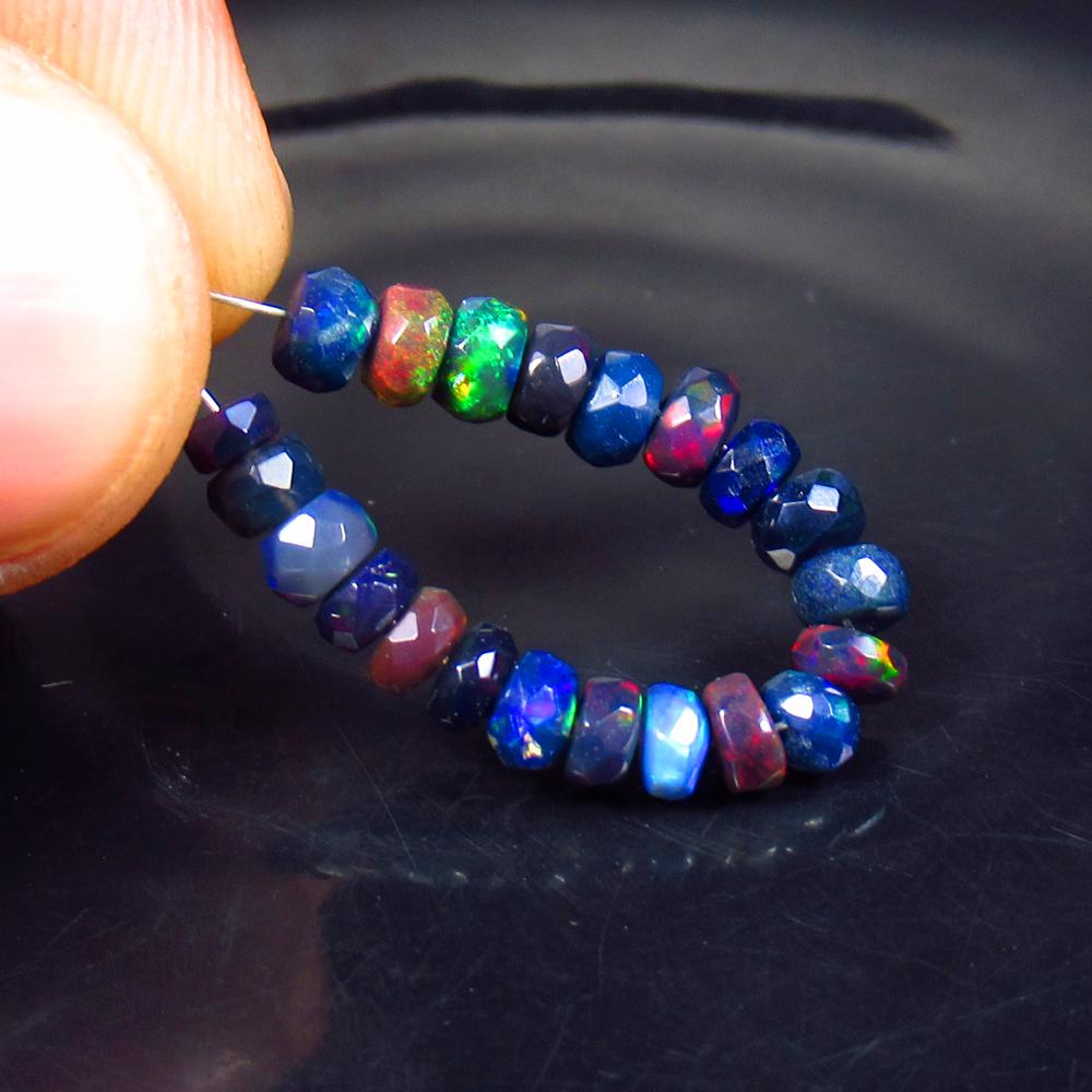 4.00 Ctw Natural 21 Drilled Faceted Black Opal Beads: Title: 4.00 Ctw Natural 21 Drilled Faceted Black Opal Beads Stone Clarity: Translucent Gemstone: Faceted Black Opal Beads Carat Weight: 4 Size/Dimensions: 3.30 to 4.40 mm / 21 PC's Additional Informat