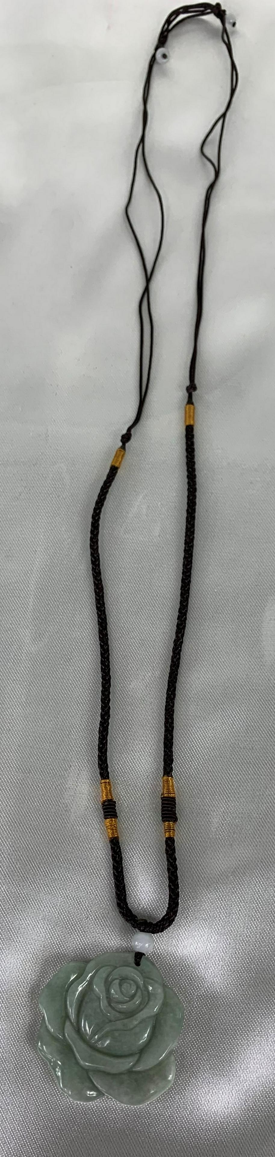 Jade Flower Pendant: Title: Jade Flower Pendant Description: Certified Grade A 100% Natural Green Jadeite Jade Pendant Hand-carved Flower 321 Date/Period: Material Used: Jade and nylon cord Size:Necklace - 14" Long, Penda