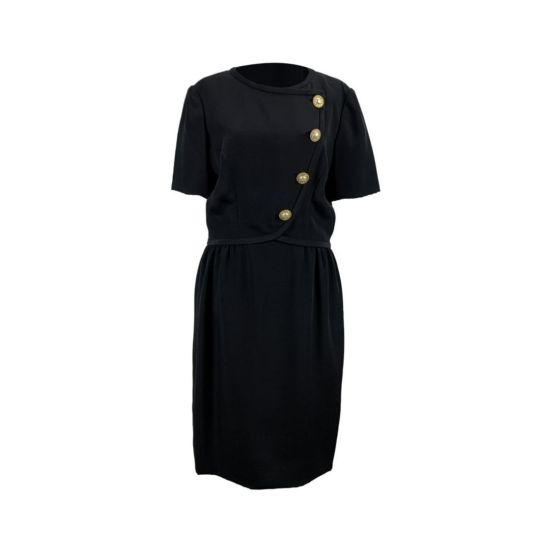 Vintage Black Sheath Short Sleeve Asymmetric Dress Size: Vintage sheath dress crafted in black fabric. Short sleeve styling..Jeweled buttons with asymmetric front design. Rear zip closure. Composition tag is missing it is a light weight fabric (probably vis