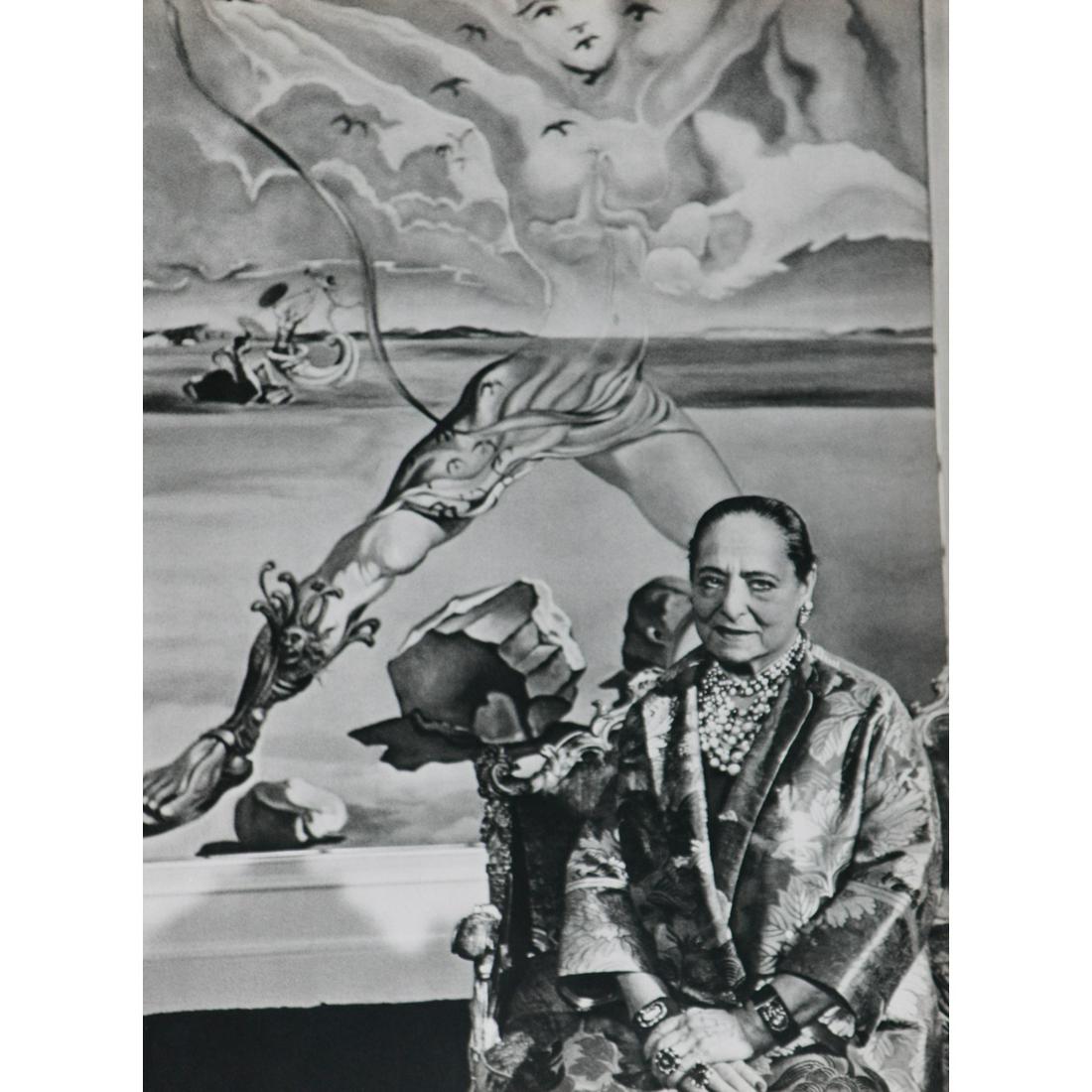 ALFRED EISENSTAEDT - Helena Rubinstein (Princess: Artist: ALFRED EISENSTAEDT Print Title: Helena Rubinstein (Princess Gourielli-Tchkonia), Mural by Salvador Dali Medium: Sheet-fed Gravure Printing Date: 1960's Printed in Switzerland Image Size approx