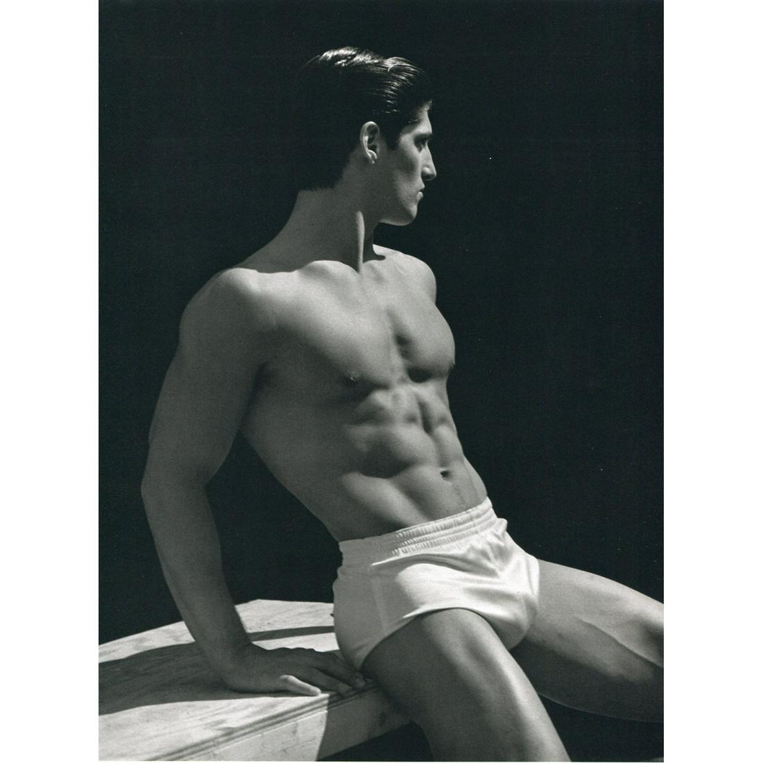BRUCE WEBER - Tony Ward 1985: Artist: BRUCE WEBER Print Title: Tony Ward, On the Roof, NYC 1985 Medium: Sheet-fed Gravure Printing Date: 1980's Printed in Spain Image Size approx: 11 X 8.5 inches Bruce Weber is an American fashion