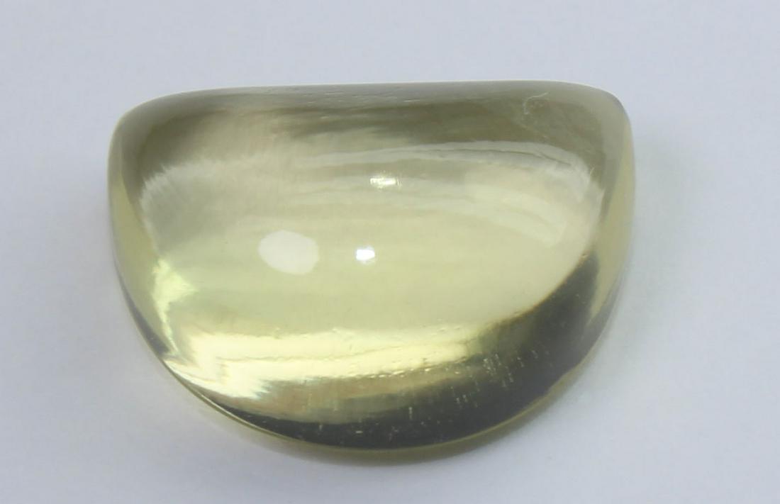 7.49 Cts Natural Lemon Quartz: No Reserve! Title: 7.49 Cts Natural Lemon Quartz Additional Information: Gemstone : Natural Lemon Quartz Weight : 7.49 Carats Dimensions : 13.9x10x6.7 mm Shape : Fancy Cabochon Colour : Greenish Yello