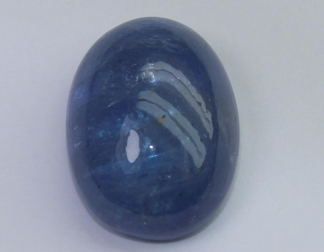 11.87 Cts Natural Tanzanite: No Reserve! Title: 11.87 Cts Natural Tanzanite Additional Information: Gemstone : Natural Tanzanite Origin : Tanzania Weight : 11.87 carats Dimensions : 15.7x11.4x7.2 mm Shape : Oval Cabochon Color : 