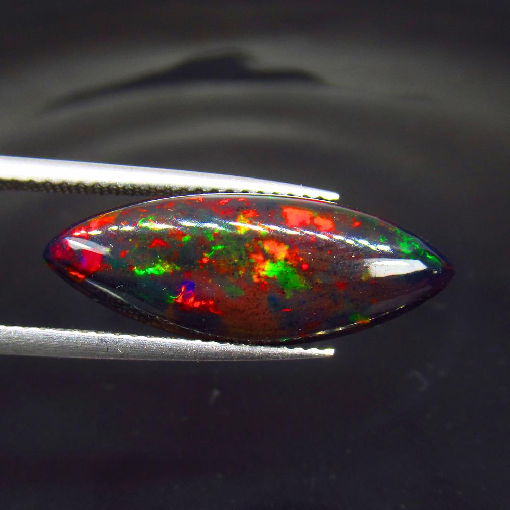 5.51 Ct Natural Ethiopian Black Fire Opal Marquise Cab (1 of 2)