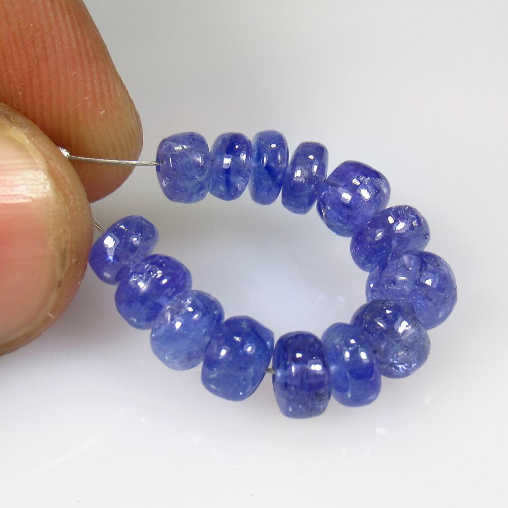 13.10 Ct Natural 14 Drilled Tanzanite Round Beads: No Reserve! Title: 13.10 Ct Natural 14 Drilled Tanzanite Round Beads Stone Clarity: Transparent Gemstone: Natural Tanzanite Beads Carat Weight: 13.1 Size/Dimension: 4.80 - 6.10 mm / 14 Pc's Additional