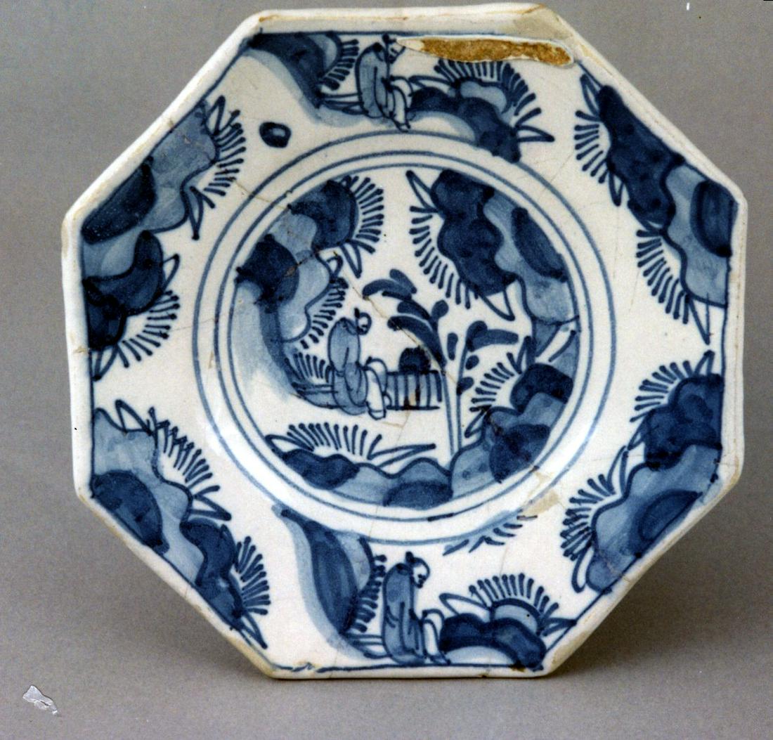 18th century Dutch delft plate depicting a central (1 of 2)