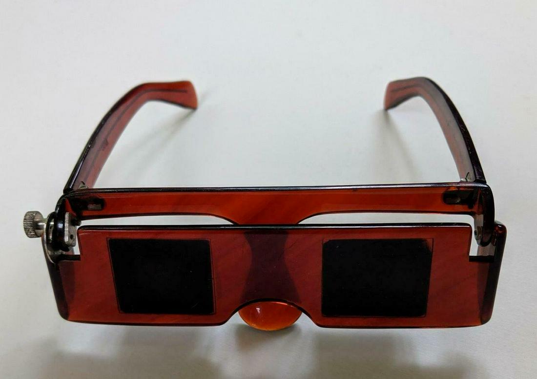 MID-20th CENTURY UNIQUE OPTICAL EYE GLASSES to INCREASE: MID-20th CENTURY UNIQUE OPTICAL EYE GLASSES to INCREASE PARALYTIC VISION RANGE MID-20th CENTURY UNIQUE OPTICAL EYE GLASSES to INCREASE PARALYTIC VISION RANGE Description Circa Mid-20th Century Optical