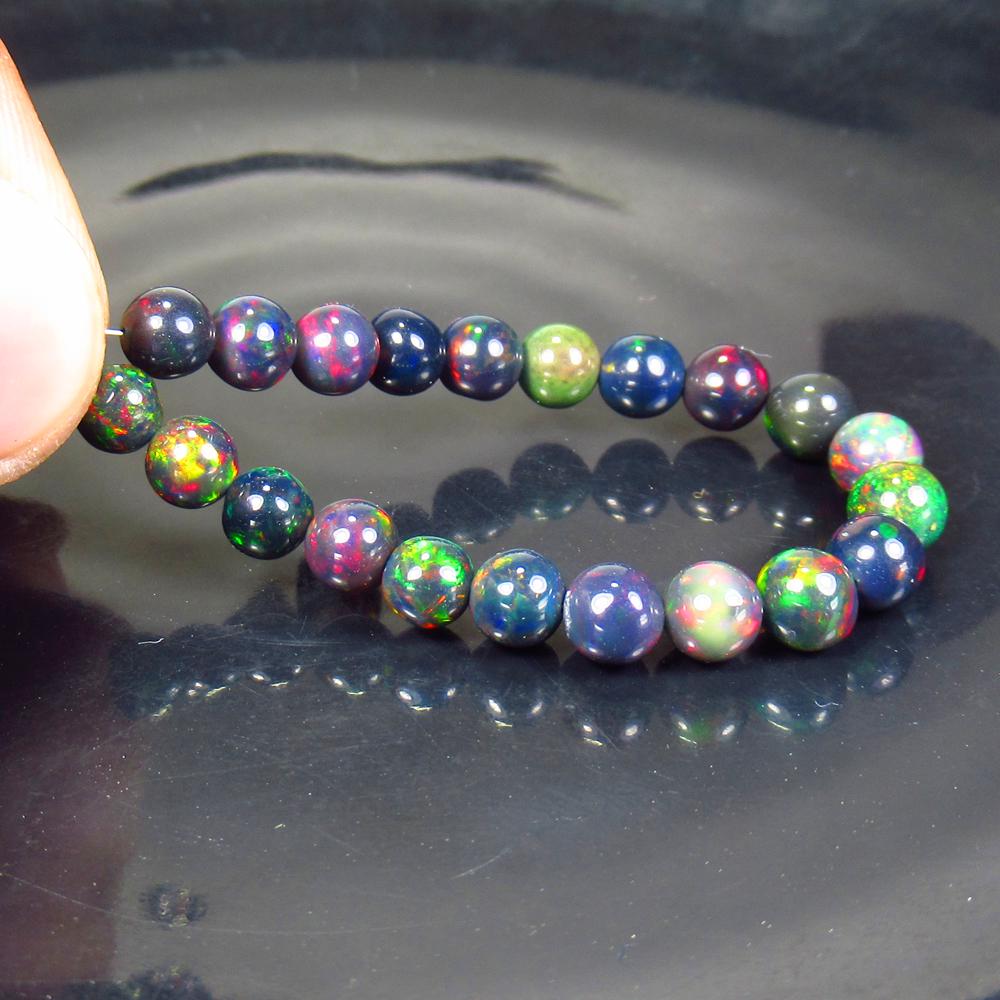 17.62 Ct Natural 21 Drilled Black Fire Opal Ball Beads (1 of 2)