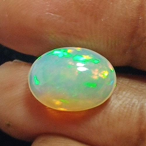 2.35 CTS NATURAL WELO WHITE OPAL OVAL SHAPE GOOD LUSTER: Title: 2.35 CTS NATURAL WELO WHITE OPAL OVAL SHAPE GOOD LUSTER LOOSE GEMSTONES Carat Weights: 2.35 Size/Dimensions: 11.5 x 8.2 x 5.6 MM Additional Information: ETHIOPIAN UNHEATED Reserve: $30.00 Shipp