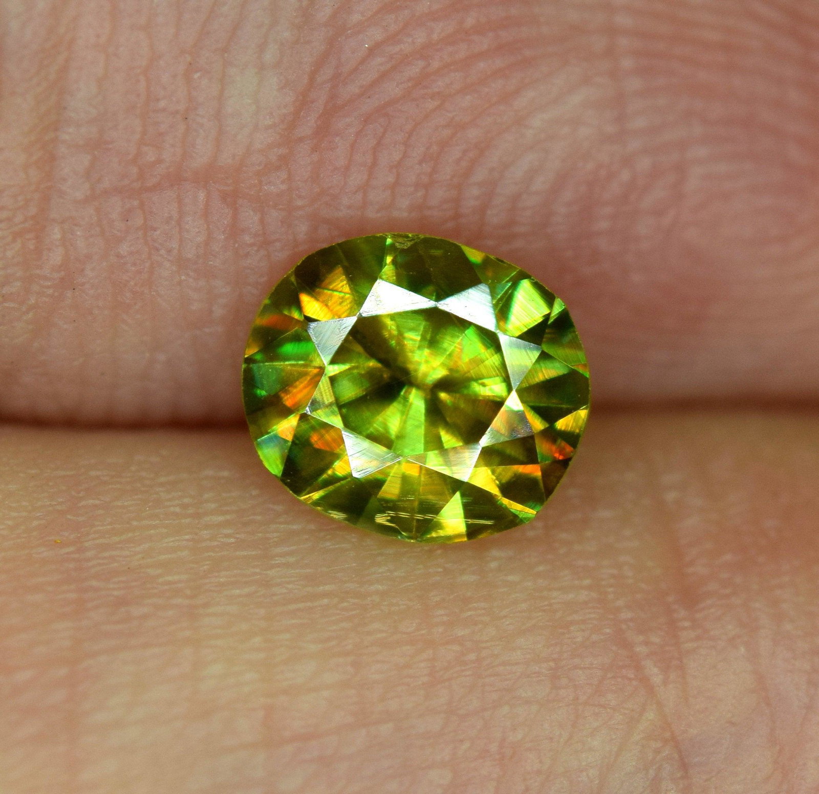 Sphene Full Fire Natural Loose Gemstone - 0.70 Carats -: Sphene Full Fire Natural Loose Gemstone - 0.70 Carats - 6*5*4 mm Weight : 0.70 Carats Size : 6*5*4 mm Origin : Pakistan Treatment : Natural Cut : Round Economy Shipping A1-61 Reserve: $30.00 Shippi