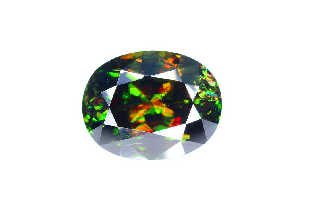 Top Dispersion Chrome Sphene Gemstone from Pakistan -: Top Dispersion Chrome Sphene Gemstone from Pakistan. Its AAA Grade Sphene Gemstone. It has Incredible Dispersion. It has excellent luster. Weight : 9.05 cts Dimensions : 14.1*11*7.2 mm Origin : Himala