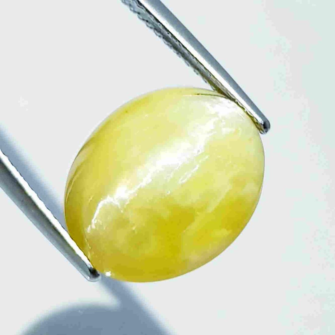 9.11 ct Natural Opal Cat's Eye: No Reserve! Title: 9.11 ct Natural Opal Cat's Eye Color/Clarity: Semi Transparent Carat Weight: 9.11 Size/Dimensions: 14.70 x 12.10 x 9.30 Additional Information: Oval - Africa Shipping: Domestic: Fl