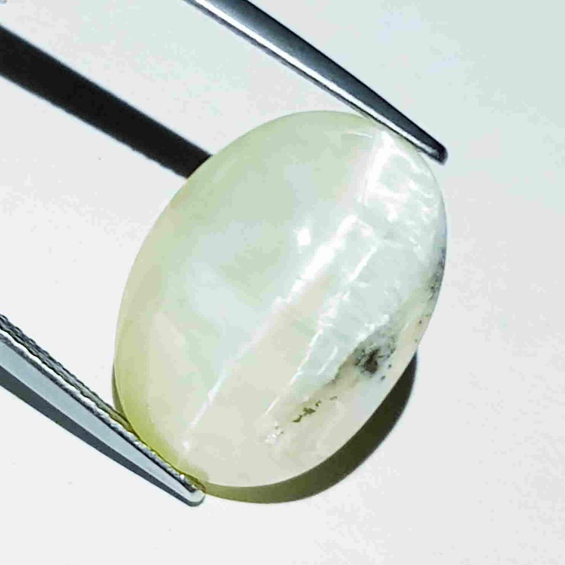 13.40 ct Natural Opal Cat's Eye: No Reserve! Title: 13.40 ct Natural Opal Cat's Eye Color/Clarity: Semi Transparent Carat Weight: 13.4 Size/Dimensions: 18.30 x 13.00 x 9.70 Additional Information: Oval - Africa Shipping: Domestic: F