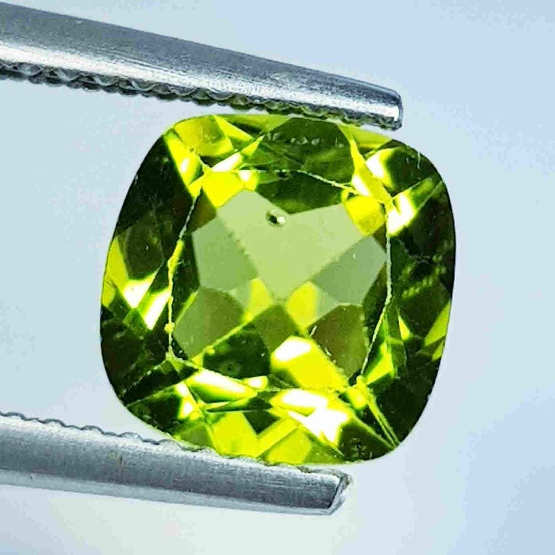 2.18 Ct Natural Peridot Cushion Cut: No Reserve! Title: 2.18 Ct Natural Peridot Cushion Cut Color/Clarity: IF - VVS Carat Weight: 2.18 Size/Dimensions: 7.80 x 7.70 x 4.70 Additional Information: Cushion / Pakistan Shipping: Domestic: Fl