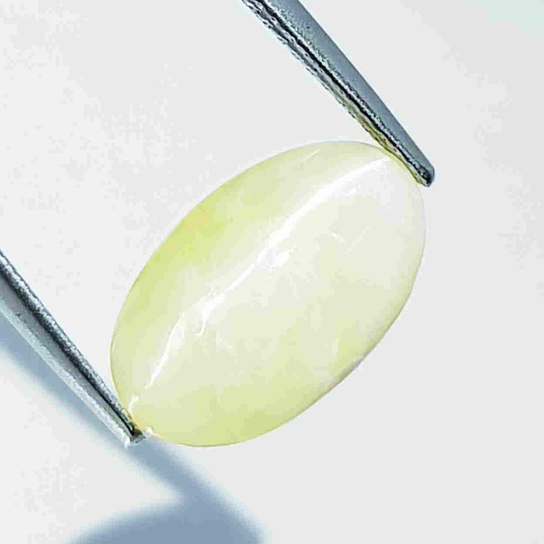 7.15 ct Natural Opal Cat's Eye: No Reserve! Title: 7.15 ct Natural Opal Cat's Eye Color/Clarity: Semi Transparent Carat Weight: 7.15 Size/Dimensions: 15.00 x 9.00 x 9.00 Additional Information: Oval - Africa Shipping: Domestic: Fla