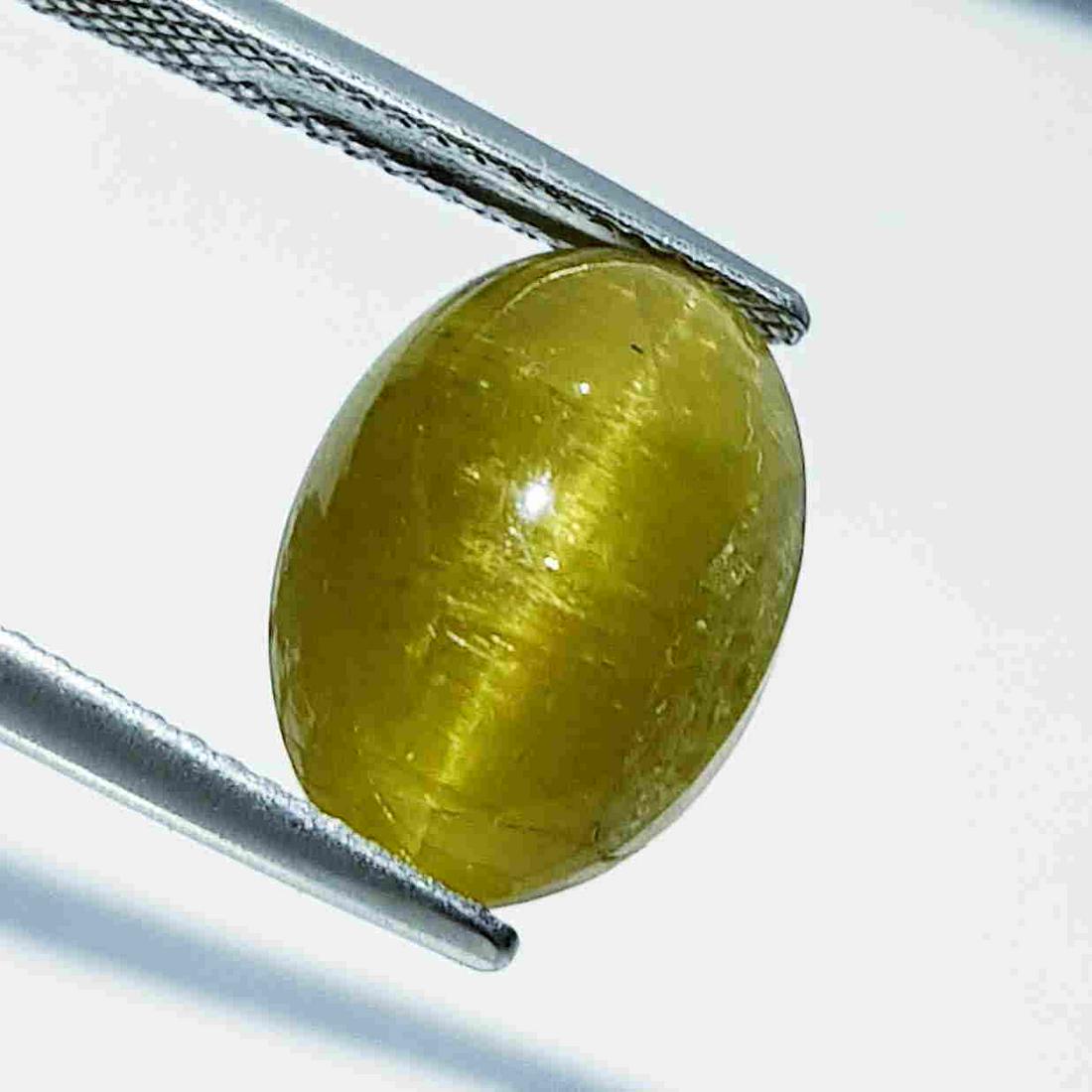 11.60 ct Natural Apatite cat's Eye: No Reserve! Title: 11.60 ct Natural Apatite cat's Eye Color/Clarity: Opaque Carat Weight: 11.6 Size/Dimensions: 14.00 x 10.30 x 9.30 Additional Information: Oval - Jharkhand Shipping: Domestic: Flat