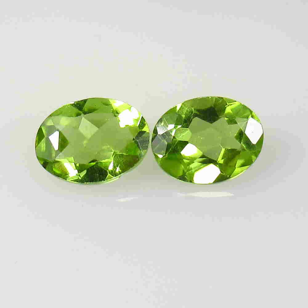 3.07 Ctw Natural Pakistan Peridot Oval Pair: No Reserve! Title: 3.07 Ctw Natural Pakistan Peridot Oval Pair Stone Clarity: VVS Gemstone: Peridot Carat Weight: 3.07 Size/Dimensions: 8.40 x 6.60 x 3.60 mm / 2 PC's Additional Information: Top Class